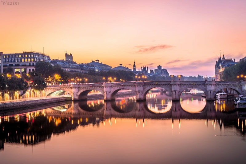 Paris at sunset, a romantic light over the river Seine
